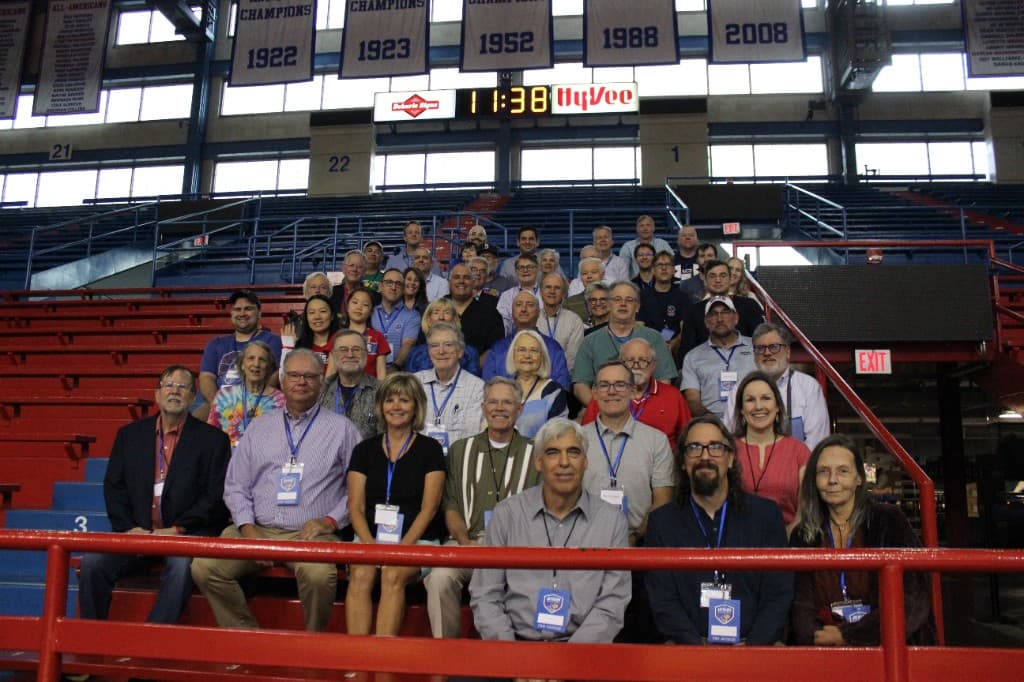 Run It Back alumni gathered in Allen Fieldhouse bleachers
